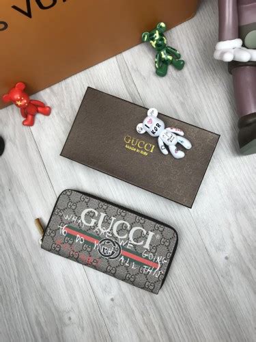 Мужские кошельки Gucci .